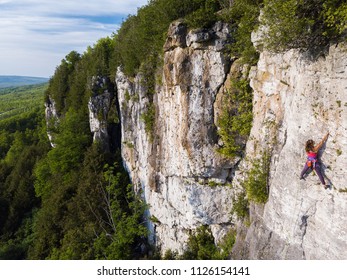 Beautiful Woman Rock Climbing In Ontario, Canada.