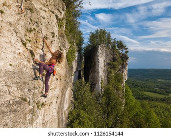 Beautiful Woman Rock Climbing In Ontario, Canada.