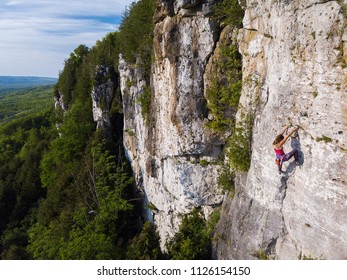 Beautiful Woman Rock Climbing In Ontario, Canada.