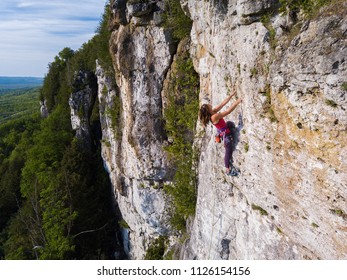 Beautiful Woman Rock Climbing In Ontario, Canada.