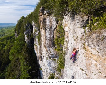 Beautiful Woman Rock Climbing In Ontario, Canada.