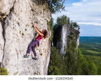 Beautiful Woman Rock Climbing In Ontario, Canada.