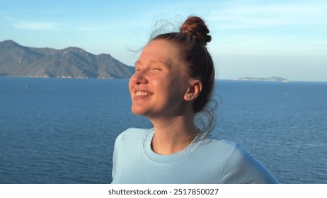 beautiful woman of the sea background on the top of the mountain in summer, concept travel hiker, deep breeze, nature - Powered by Shutterstock