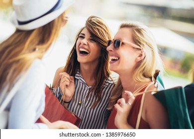 Beautiful Woman With Shopping Bags In The City-sale, Shopping, Tourism And Happy People Concept