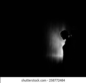 Beautiful Woman Silhouette, Black Background.