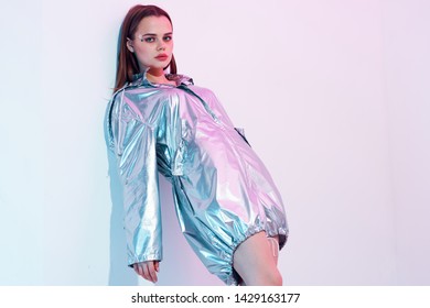 A Beautiful Woman In A Silky Robe Leaned Over A Light Wall Party Disco                       