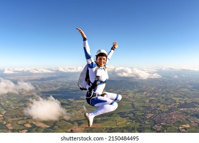 Beautiful Woman Skydiving In Freefall, Adventure Freedom Concept