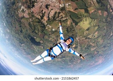 Beautiful Woman Skydiving In Freefall, Adventure Freedom Concept