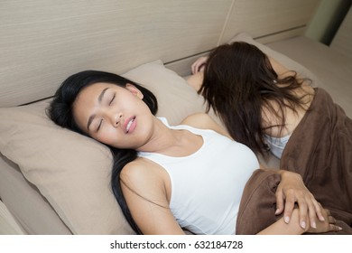 Beautiful Woman Sleep With Friend, Young Women Sleeping In Bed At Home, 20-28 Year Old