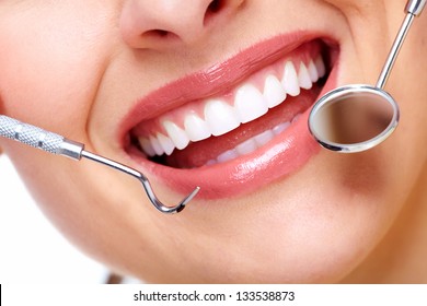 Beautiful woman smile. Dental health care clinic. - Powered by Shutterstock