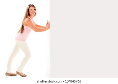 Beautiful Woman Smiling An Pushing A Wall