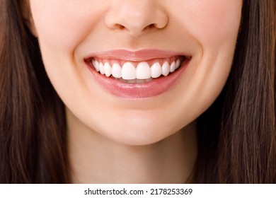 A beautiful woman is smiling. a smile with white teeth. Close up image. - Shutterstock ID 2178253369