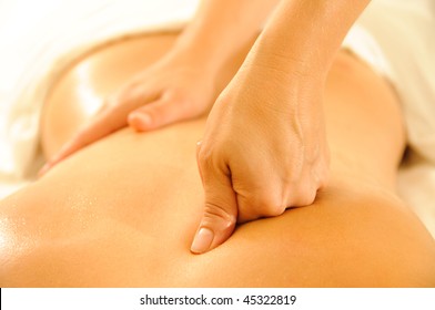 Beautiful Woman In A Spa With Massage Therapy