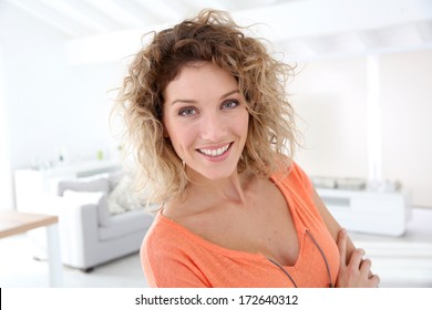 Beautiful Woman Standing In Brand New Home