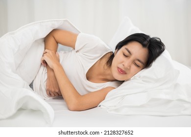 Beautiful Woman Stomach Ache Can't Fall Asleep, Moving Restless On Bed At Night. Young Woman Having Period Pain Sleep Troubles Trying Can Not Sleep.