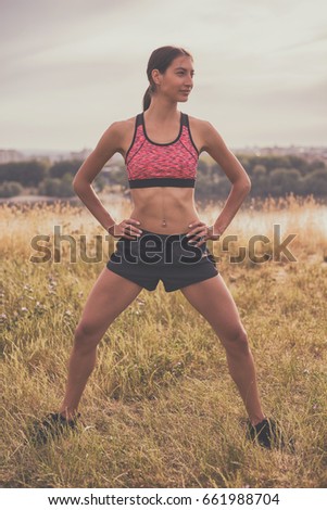 Similar – Image, Stock Photo Fit muscular woman working out in a park