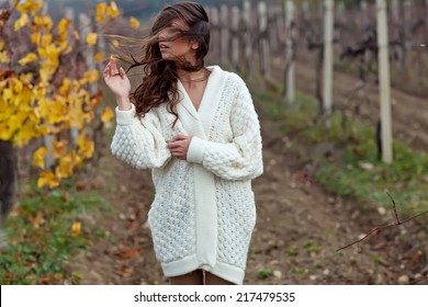 Beautiful Woman In A Sweater In The Fall