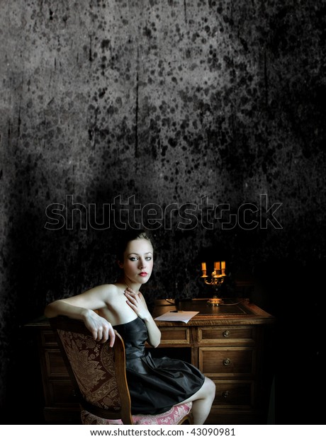 beautiful woman taking inspiration for writing romantic letter