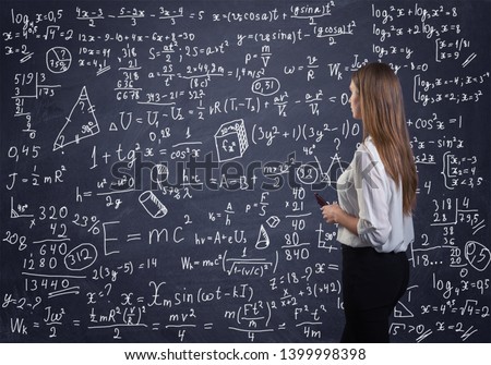 Beautiful woman thinking how to solve a math problem