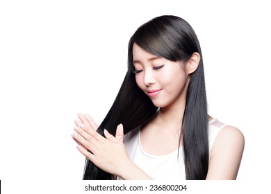 Beautiful Woman touch her health long straight hair care with smile face, asian beauty model