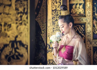 Beautiful Woman In Traditional Dress Costume,Asian Woman Wearing Typical Thai Dress Identity Culture Of Thailand