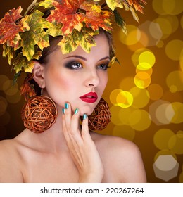 Beautiful Woman With Tree Autmn Ornament In Head. Studio. Beauty And Fashion. Young Woman Portrait With Autmn Tree Concept