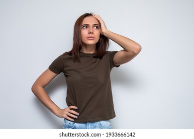 Beautiful Woman Trying To Remember Something With Face Expression On Her Face