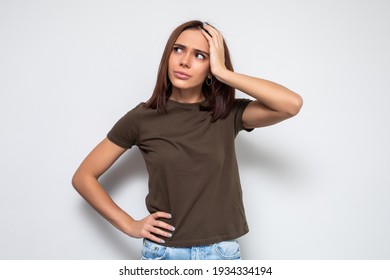 Beautiful Woman Trying To Remember Something With Face Expression On Her Face