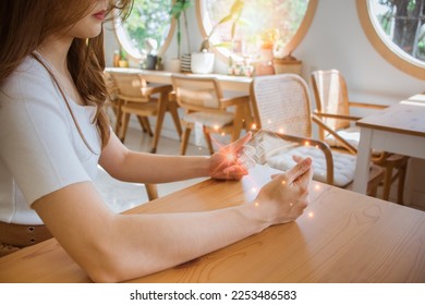 Beautiful woman using future smart phone virtual touch screen for order online shopping product. Multimedia Technology. Concept of Digital Future, food delivery, money wallet  online payment. - Shutterstock ID 2253486583
