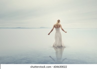 beautiful woman vanishing in the water