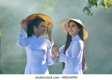 Beautiful  woman with Vietnam culture traditional dress,vintage style,Vietnam