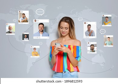 Beautiful woman visiting online dating site via smartphone on light grey background - Shutterstock ID 1896812593