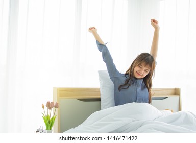 A Beautiful Woman Is Waking Up With Freshness In The Morning After Having A Good Sleep All Night, Stay On Her Clean Bed