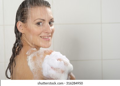 Beautiful Woman Washing Her Body Shower Gel