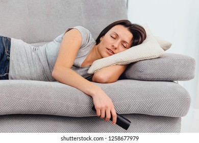 Beautiful Woman Watching TV Fell Asleep.