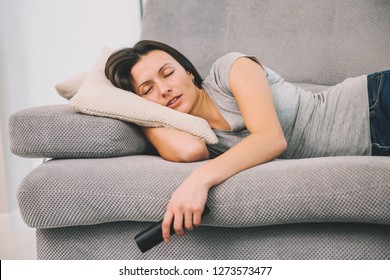 Beautiful Woman Watching TV Fell Asleep.