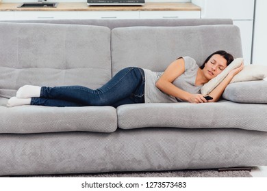 Beautiful Woman Watching TV Fell Asleep.