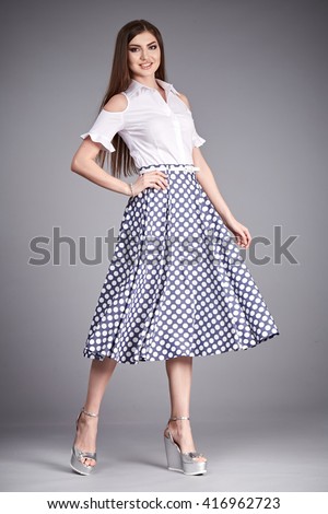 https://image.shutterstock.com/image-photo/beautiful-woman-wear-skirt-blouse-450w-416962723.jpg