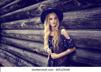 Beautiful Woman Wearing Boho Chic Clothes. Outdoor Fashion Portrait