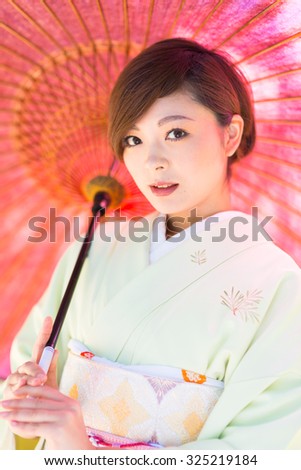 Similar – Foto Bild Frau in roten Kimono malt in blau