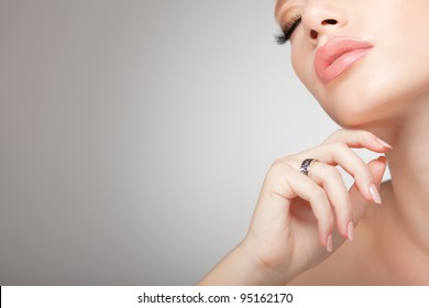 beautiful woman wearing jewelry, very clean image with copy space - Powered by Shutterstock