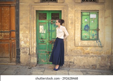 Beautiful Woman Wearing A Long Blue Skirt