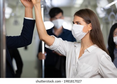 beautiful woman wearing medical face mask for protect coronavirus or covid-19 pandemic conditions - Shutterstock ID 1981817027