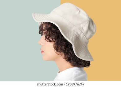 Beautiful Woman In White Bucket Hat Fashion Studio Shoot