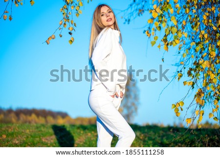 Similar – Young woman doing yoga in nature