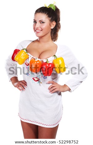 beautiful woman in white dress with fresh paprika