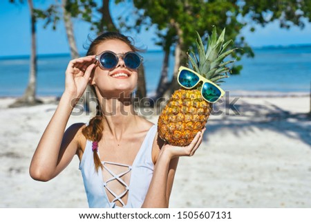 Beautiful woman in white dress pineapple summer travel tropics
