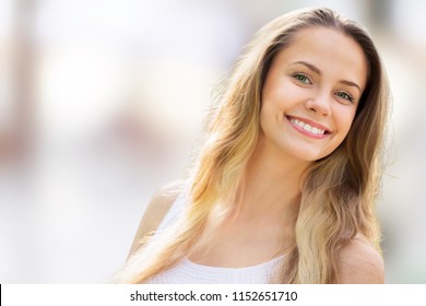 Beautiful Woman With A Whiten Perfect Smile