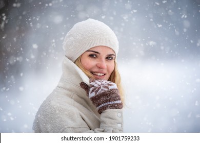 Beautiful Woman In Wintertime Among Snow