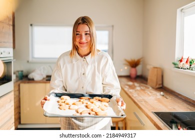 Beautiful Woman Young Mom Holding Tray With Fresh Baked Cookies And Giving A Treat For Kids